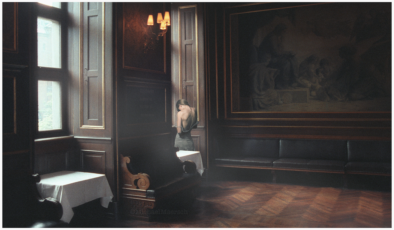 young woman partialy undressed standing at a window in darkened formal room